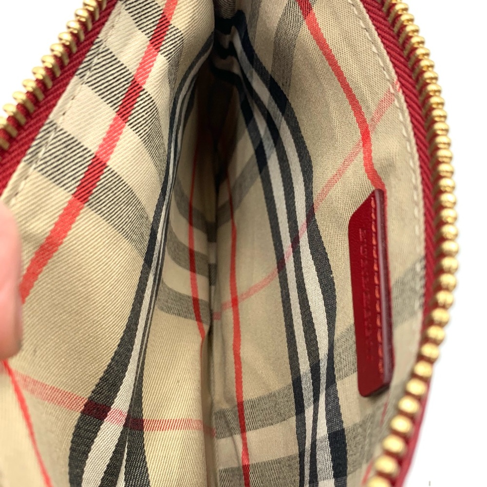 Auth Burberry Peyton Crossbody Clutch with Tassel in Rich Cranberry Red. $485 - Picture 10 of 13
